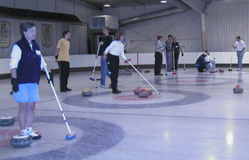 Curlers waiting between shots