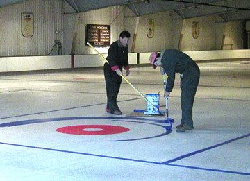 Painting between the lines on curling ice